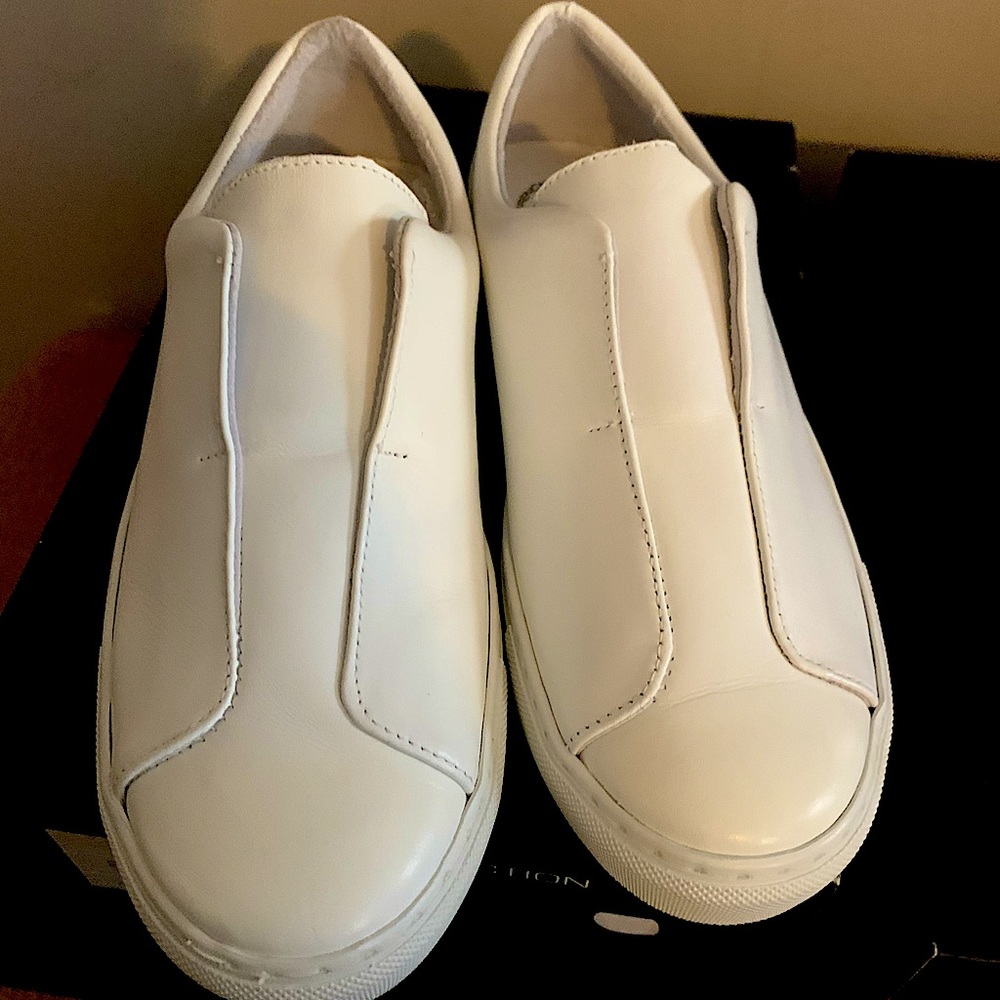 French Connection. Brand New. UK 39. White flats.